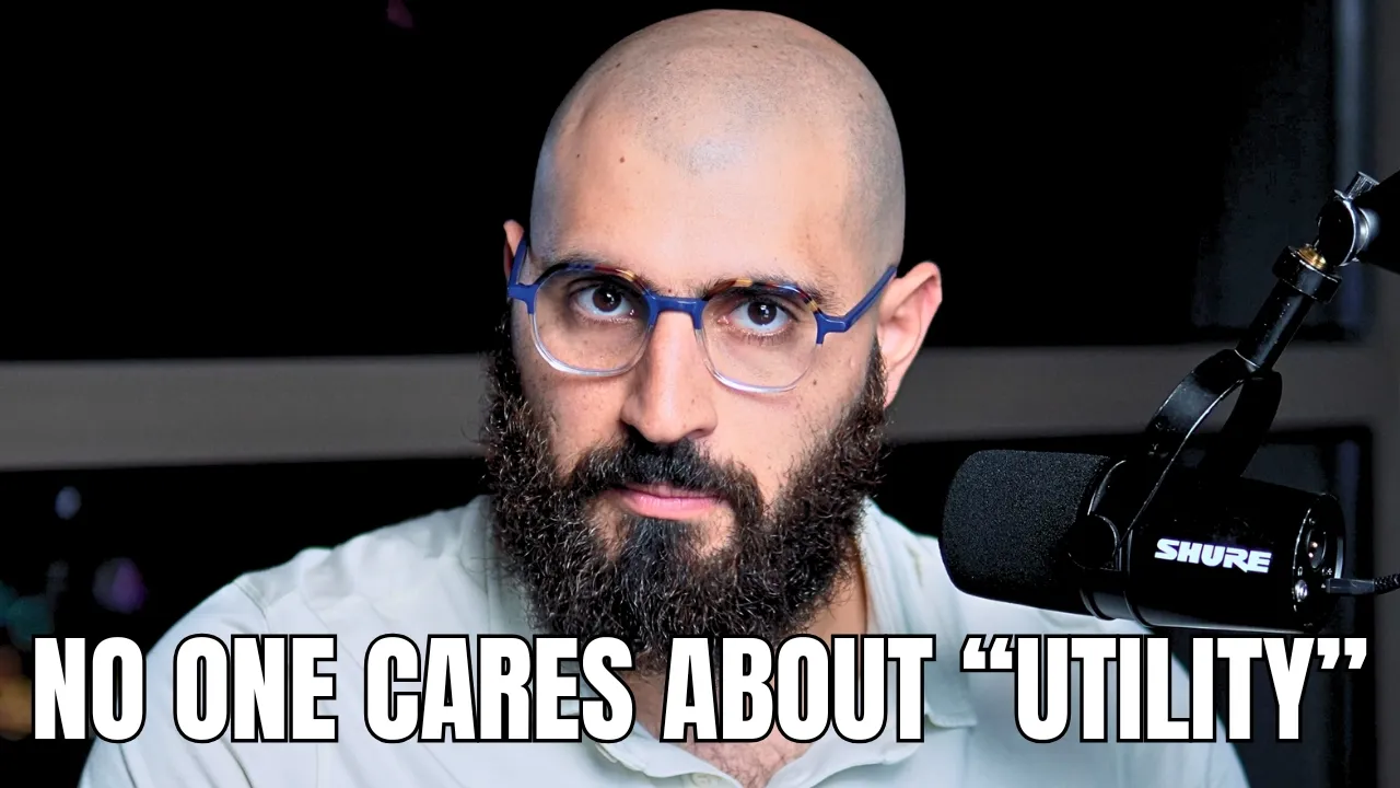 Bald bearded man in blue glasses beside a black microphone, with the words No one cares about utility